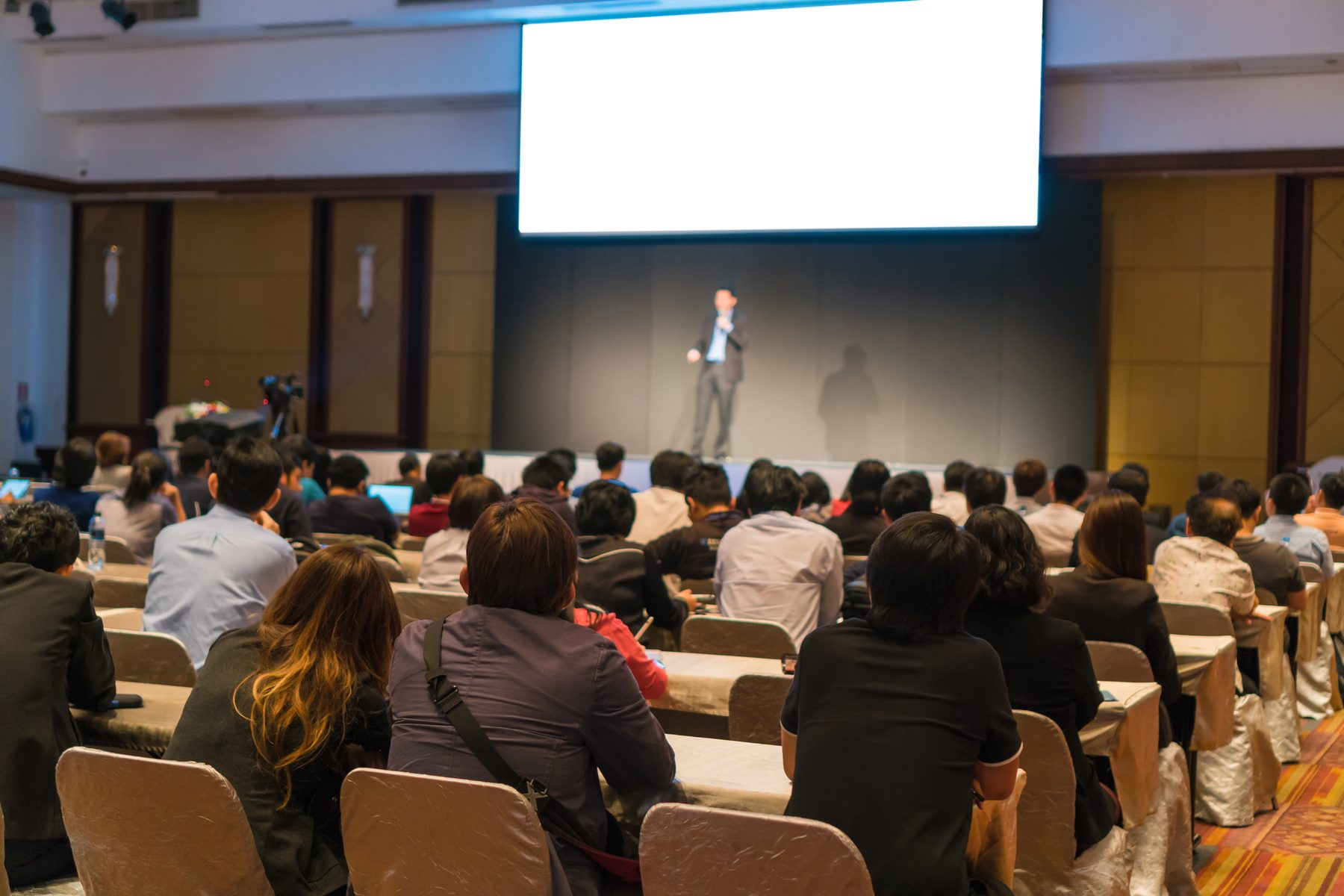Audience listening to a speaker
